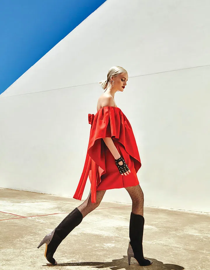 Valentino. Metal earrings, Salvatore Ferragamo. Suede, leather and snakeskin boots, Givenchy. Fingerless gloves; stockings, stylist’s own