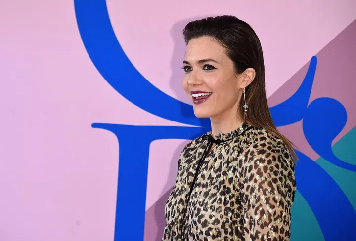 Mandy Moore looked fierce in graphic eye liner, eggplant lips and voluminous pompadour.

Photo: Getty Images
