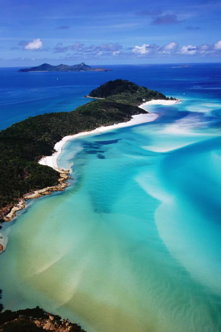 Your honeymoon is a once in a lifetime type of trip, so naturally you should pick a once in a lifetime kind of destination. This continent may be packed with destinations to choose between–from Tasmania and Adelaide to Sydney or Melbourne, but Australia's Whitsunday Islands are that kind of life-changing place. Photo: Getty