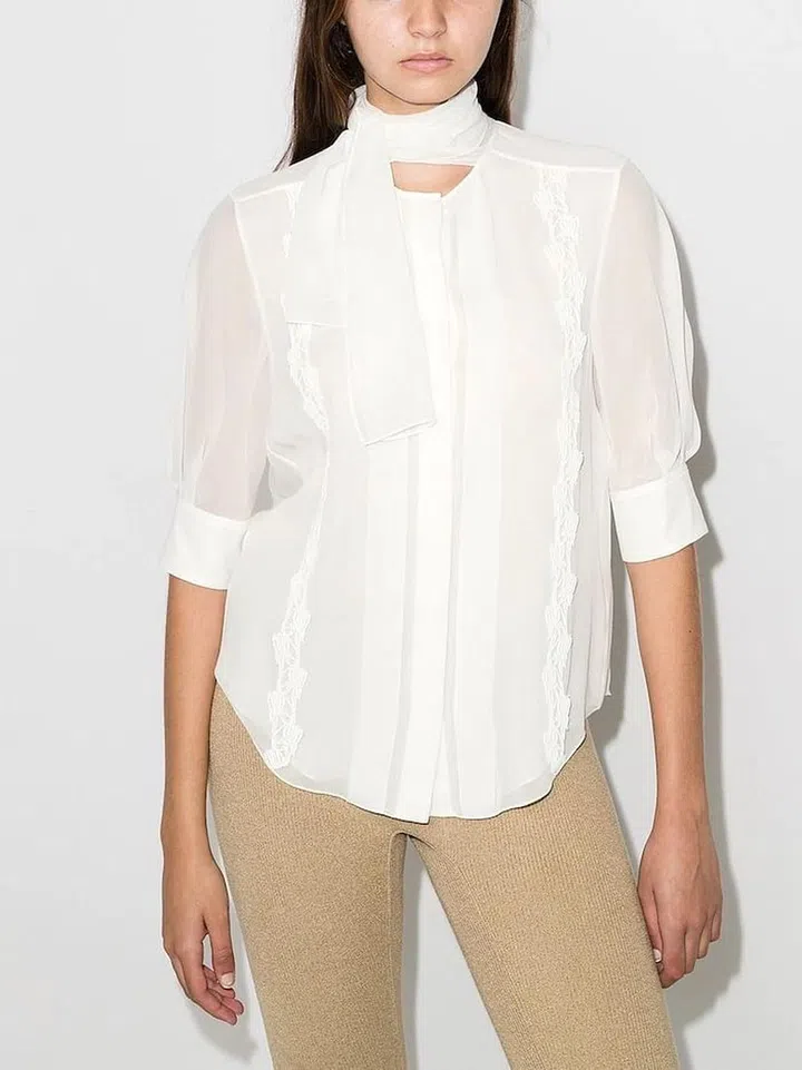 Scarf-Neck Silk Shirt, $2,306, Chloe at Farfetch. (Photo: Farfetch)