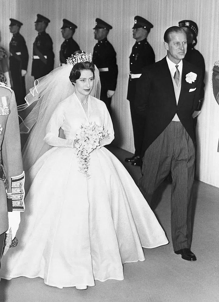 Princess Margaret accompanied by her brother-in-law Prince Philip on her wedding day. Photo: Getty 