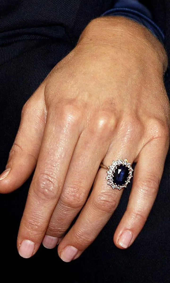 A diamond solitaire wouldn't cut it for Kate. Her sapphire and diamond engagement ring belonged to Princess Diana.
