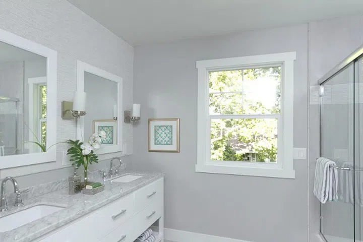 "This colour provides a clean, sophisticated backdrop," says interior designer Kerrie Kelly. "But also adds a nice warmth when paired with white trim."
