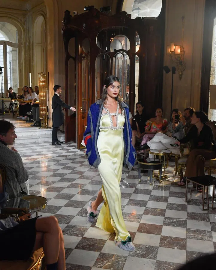 The model walks the runway in Paris.

Photo: Getty