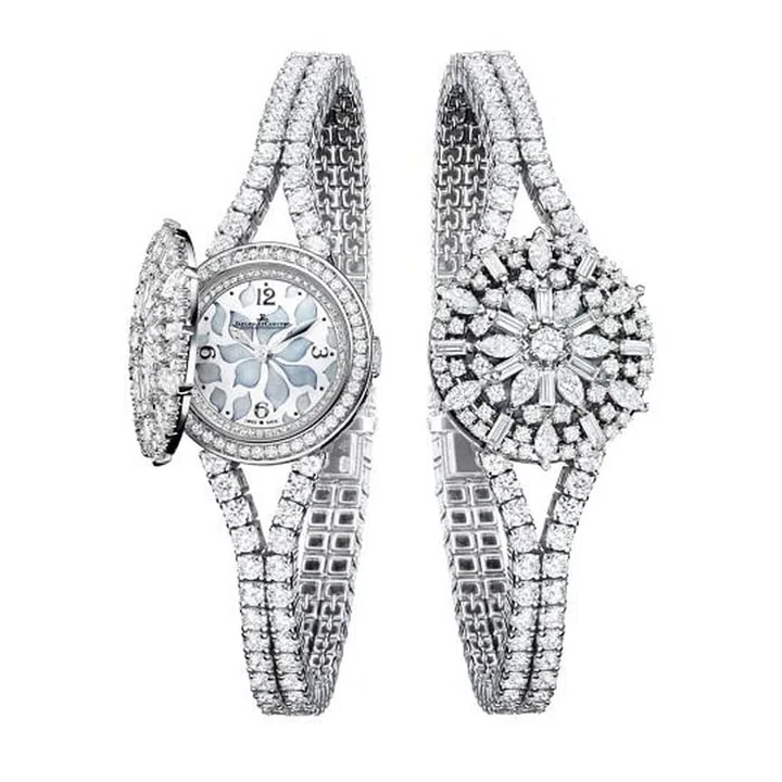 A piece recreated from the Jaeger-LeCoultre archives, the Rendez-Vous Secret watch first made its appearance in the 1960s. Brilliant, baguette, and marquis-cut diamonds make up the sparkling cover that lifts to reveal the hand-painted mother-of-pearl dial underneath. The timepiece features a manually-wound movement with a 38-hour power reserve, impressive for a watch of this tiny size—the case is only 15.3 mm wide.
jaeger-lecoultre.com