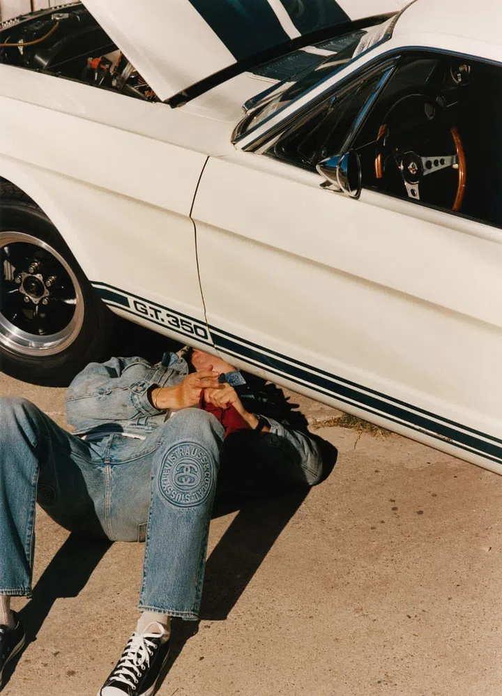 The 501 Jeans featuring an embossed Stüssy & Levi’s® motif on the front left and back right legs,
