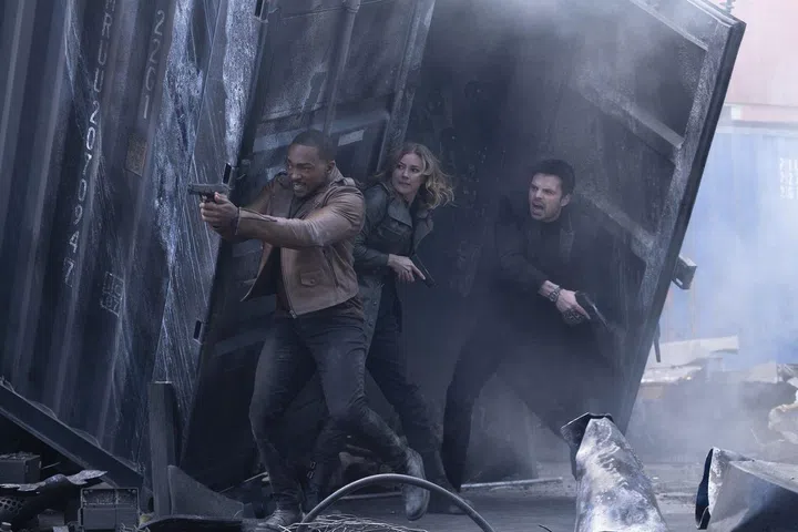 left to right: Anthony Mackie (as Falcon/Sam Wilson), Emily VanCamp (as Agent Sharon Carter) and Sebastian Stan (as Bucky Barnes/Winter Soldier). Photo by Chuck Zlotnick.