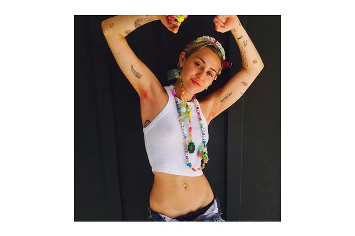 Feminists took the body positive movement a step further and showed their hair pride with neon dye in unexpected places. ; Photo: Instagram