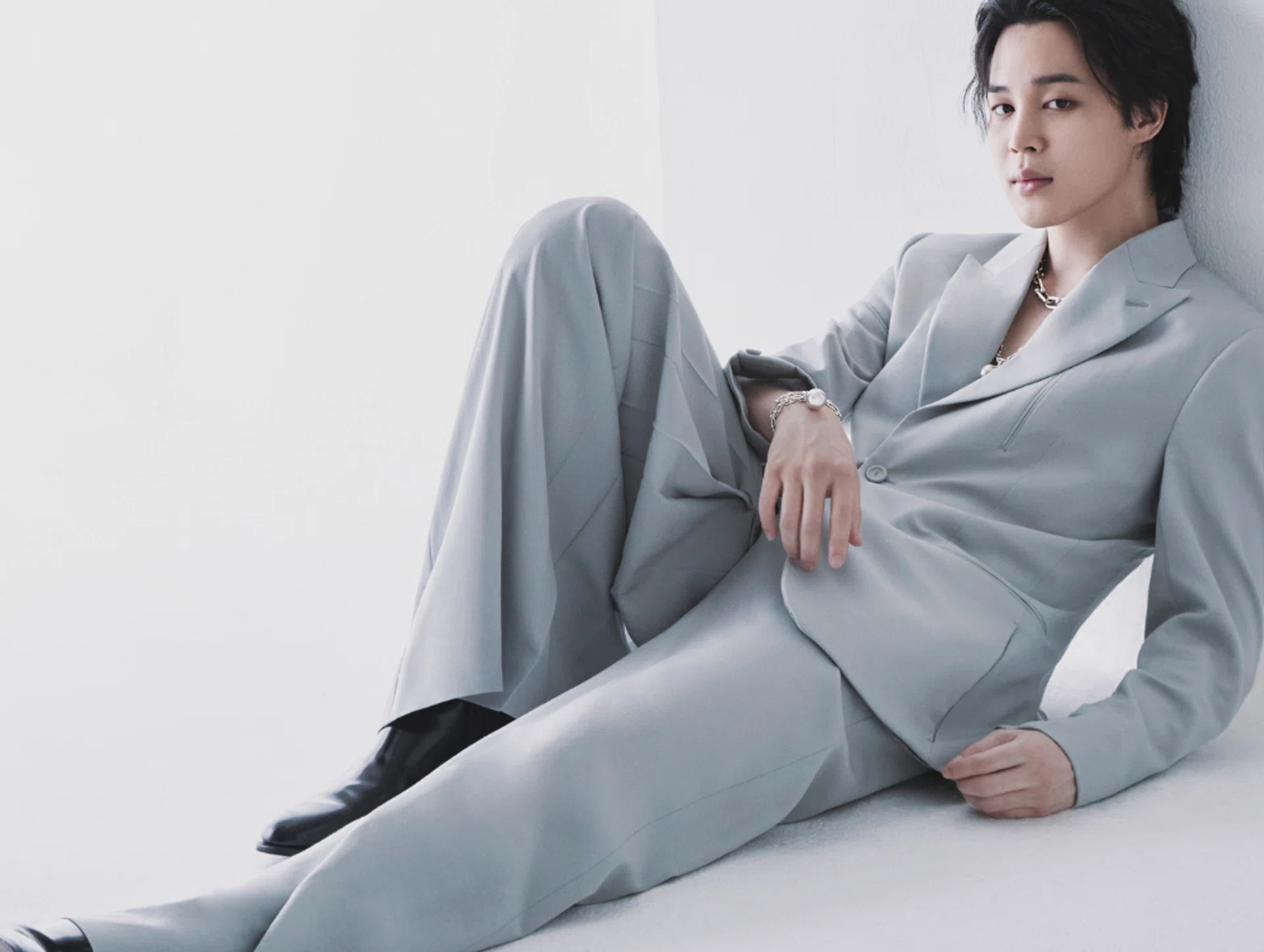 Silver Tiffany HardWear wrap necklace; bracelet, Tiffany & Co. Jacket; trousers; shoes, Dior.