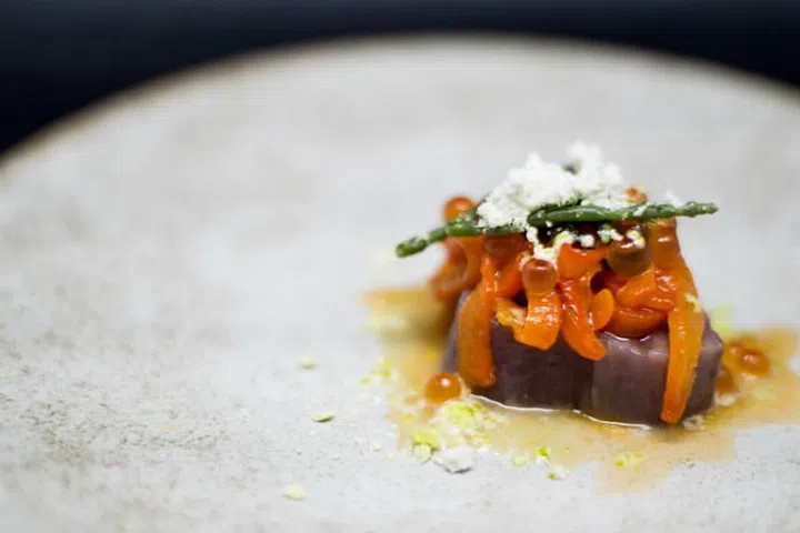 Salt-aged fish served with beads of precious caviar and enhanced with a dash of fresh yuzu. Photo: Lewin Terrace
