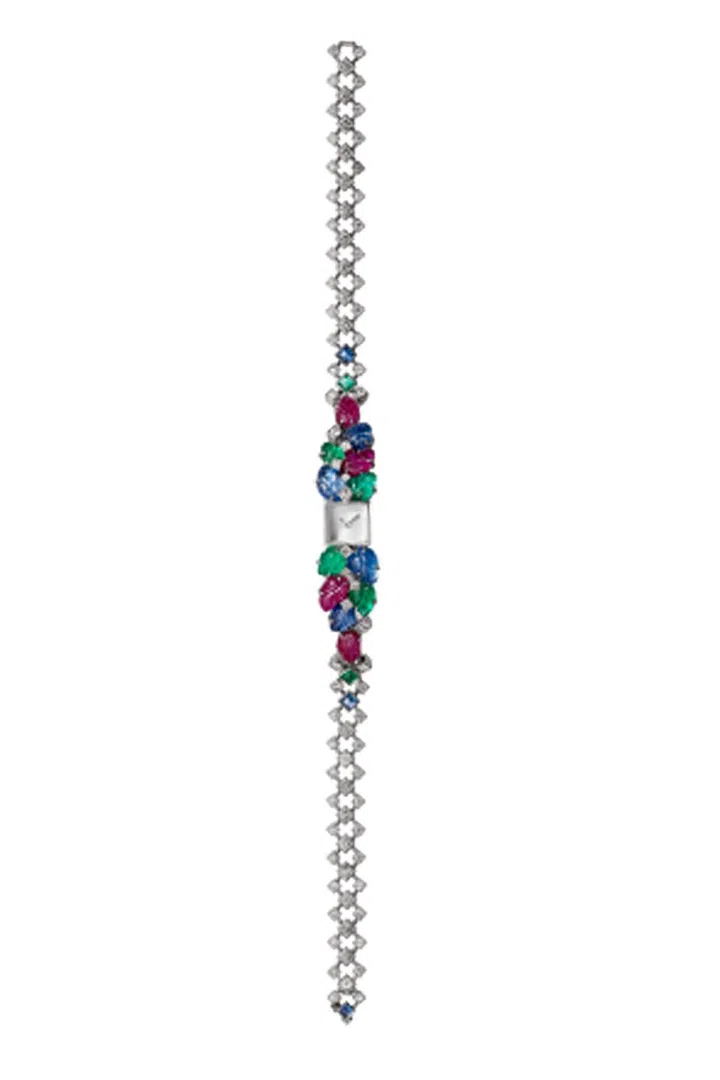 Based on the historic Tutti Frutti style first introduced in 1901, Cartier reinterprets the design as an elegantly small, 18K white gold watch for 2016. With its iconic mix of diamonds, engraved rubies, sapphires, and emeralds, the Tiny Tutti Frutti looks as modern today as it has for the last century. Vintage Cartier Tutti Frutti pieces continue to set record breaking prices at auction, and this manual-wind timepiece should be an instant classic.
Cartier High Jewelry Watch. Available by appointment only. For more information please contact 1-800-CARTIER or visit cartier.us. Photo: Cartier
