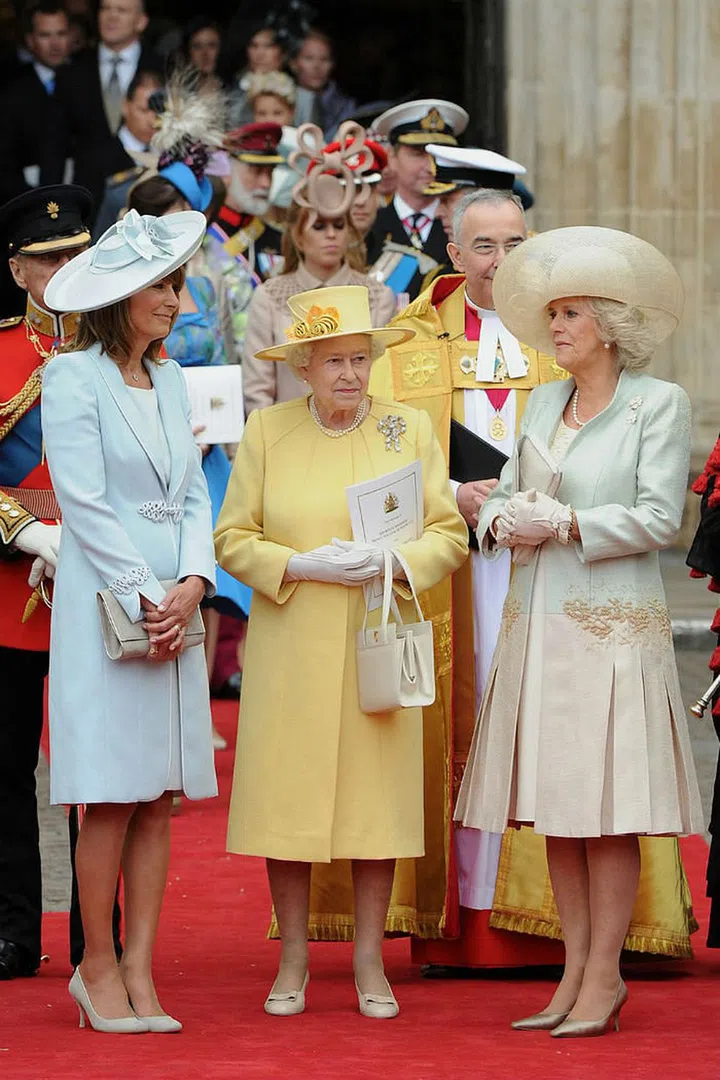 Carole Middleton, Queen Elizabeth II, and Camilla, Duchess of Cornwall, convene after the ceremony.
Photo: Getty
