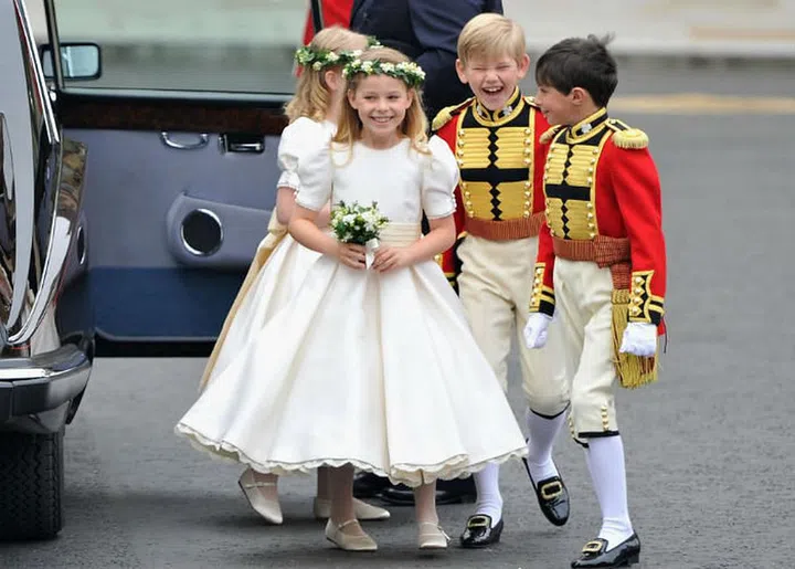 Tom Pettifer, Master William Lowther-Pinkerton, Lady Louise Windsor, and Margarita Armstrong-Jones arrive at the Abbey.Photo: Getty

