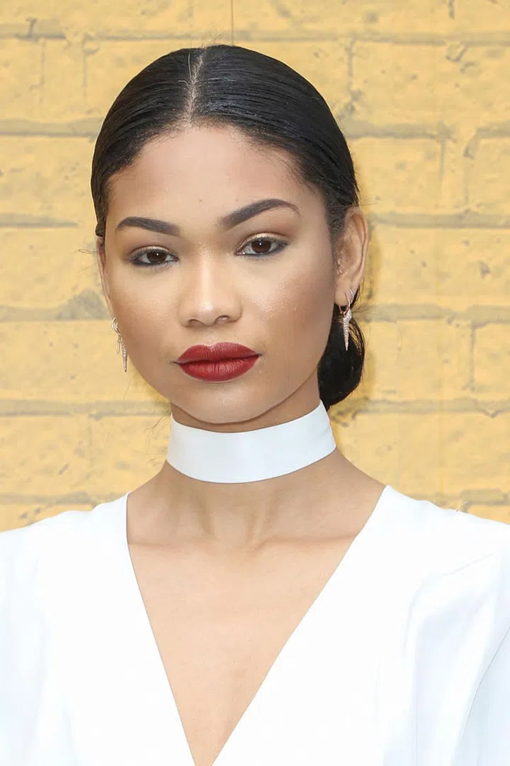 A rich shade of red stood in stark contrast to the model's white outfit.
