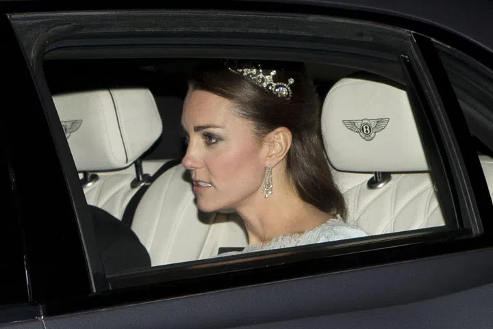 At the Annual Diplomatic Reception in 2013, the Duchess wore almost the exact outfit she wore to the event in 2015. The blue Alexander McQueen dress and borrowed earrings from Queen Elizabeth were the same, but at the 2013 occasion Kate opted for the Lotus Flower Tiara.

