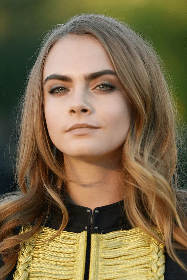 Looking fierce in face framing locks and smoked out eyes.