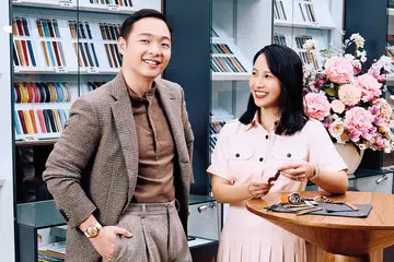 founders of delugs kenneth kuan chia pei qi wearing loro piana clothing presenting their watch collection