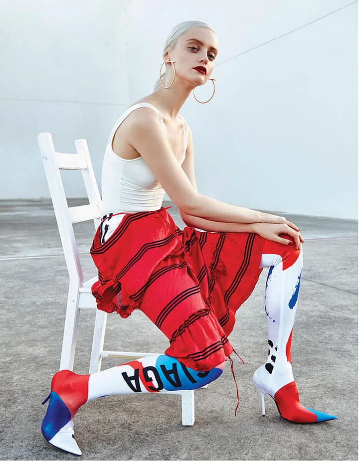 Lycra and silk dress; Lycra and leather Pantashoes, Balenciaga. Metal earrings, Salvatore Feragamo