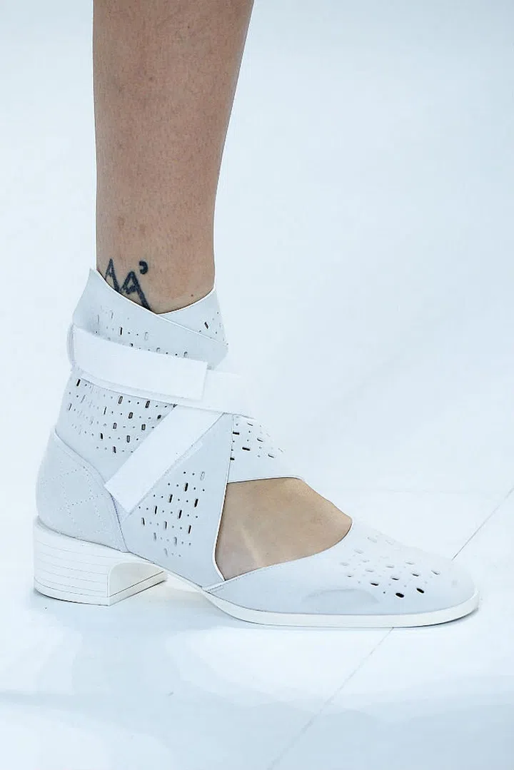 Seen in: Paris Fashion Week SS17 // The velcro ankle straps, a top cut-out section, and artful perforations seen on this pair of low-heeled number by Chanel epitomises the term "casual chic" perfectly (Photo: Getty)