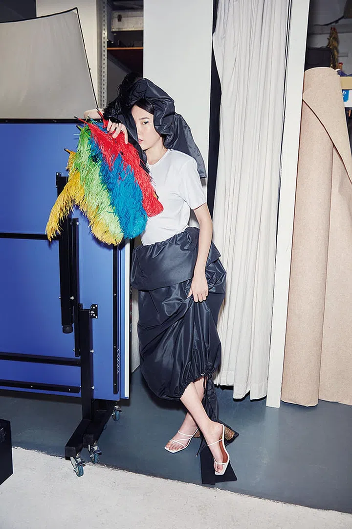 Though he lifted cues from Eighties silhouettes and old-school couture, Boonsong had the modern, mobile woman in mind, making his clothes contemporary with modern fabrics such as lightweight nylons that float in movement and are a breeze to pack into suitcases.