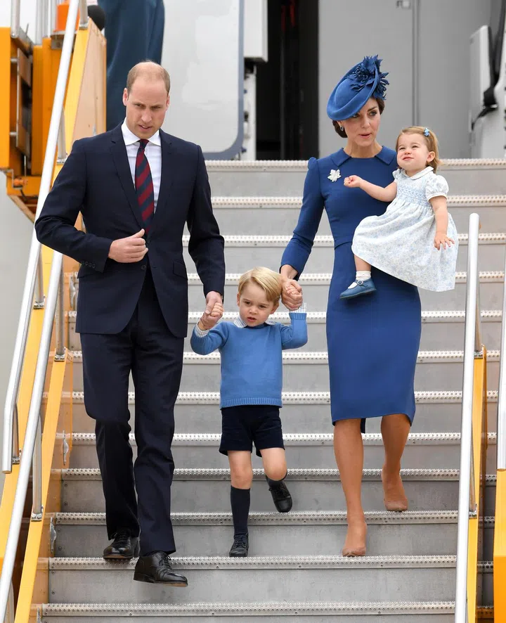 The Duchess of Cambridge looked appropriately regal in a royal blue, long-sleeved dress and accessorised with a matching hat. Photo: Getty