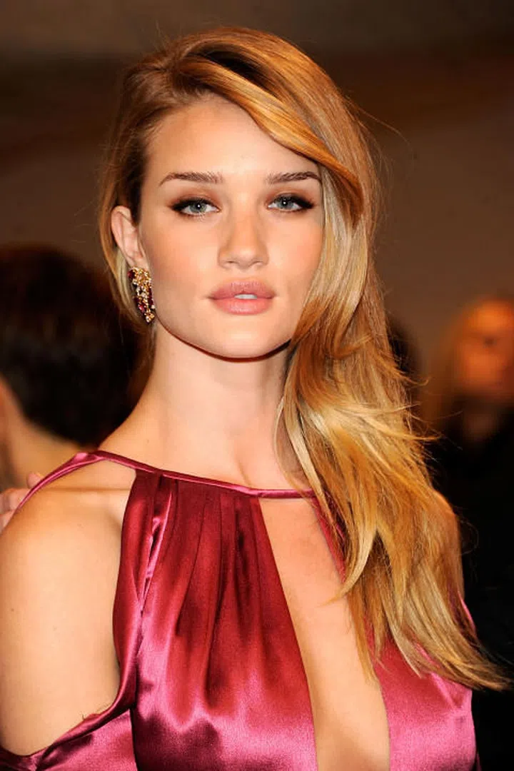 The style: Side-parted and lightly tousled blonde tresses has become a style that is often associated with the model and actress. Photo: Getty