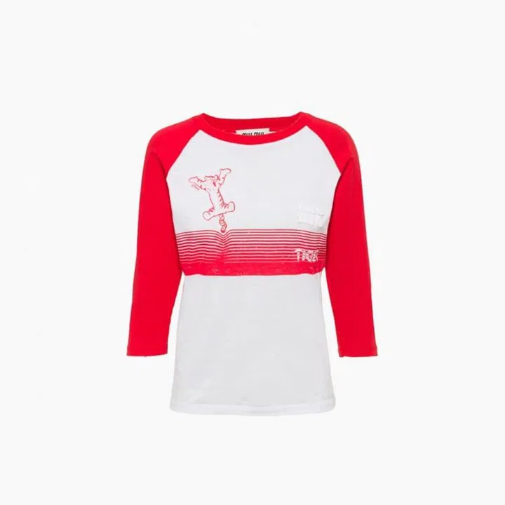 Embroidered cotton T-shirt, $1,050, Miu Miu

