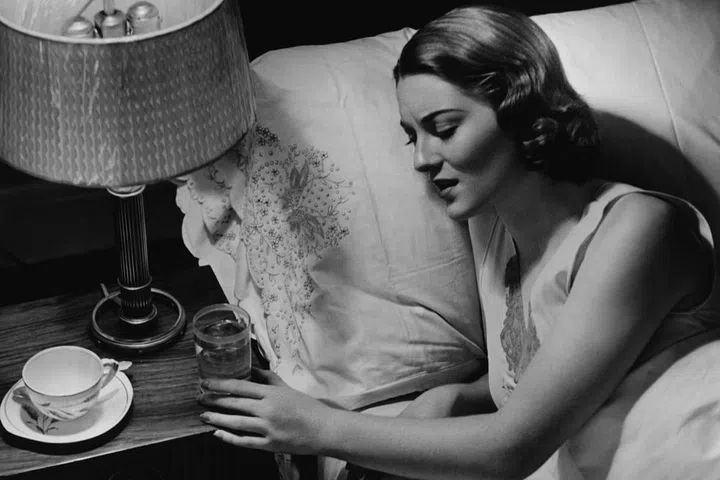 Some people swear by transitioning from regular globes to smart bulbs that emit brighter and dimmer lights at different hours of the day in order to match the sun's light at any given moment. And the National Sleep Foundation supports this idea, suggesting that people dim lights before bedtime and set a temperature that falls between 60 and 67 degrees to get to sleep faster.

Dr. Kennedy also says people can offset early morning fatigue from dehydration by putting a glass of water next to your bed and drinking it down as soon as the alarm goes off. Photo: Getty