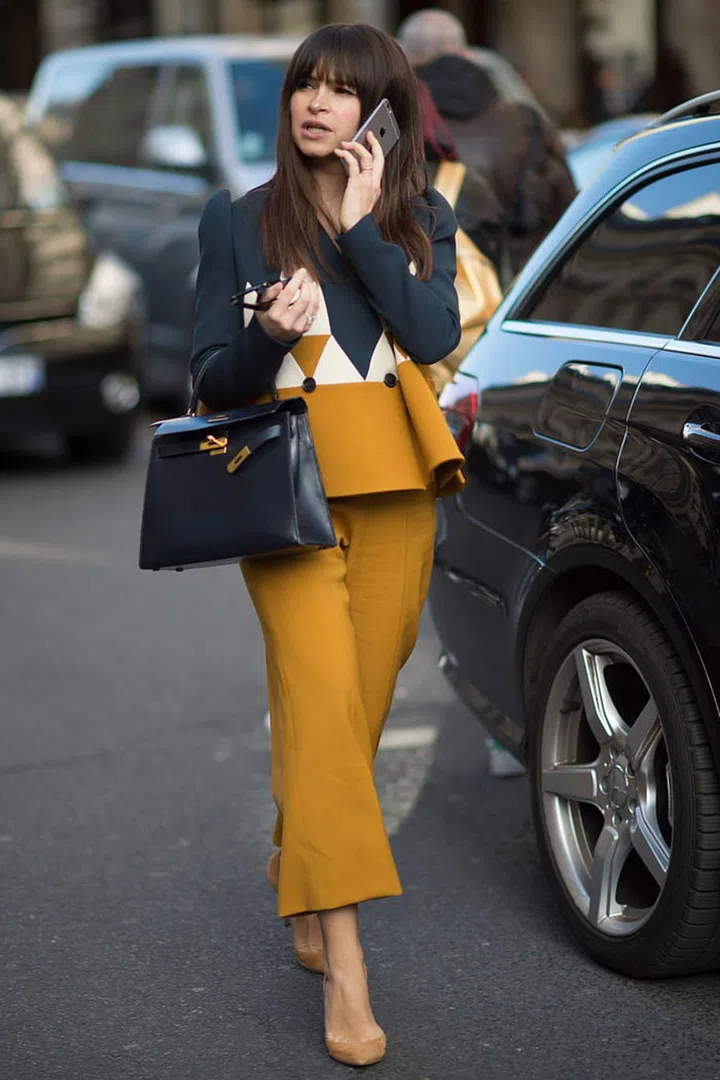 Just like with your hemlines when it comes to skirts and dresses, the same can be said for trousers and jeans. If you show off a bit of ankle, it will give the illusion that your legs are too long for the trousers and you will immediately add a few inches to your height.
Photo: Getty