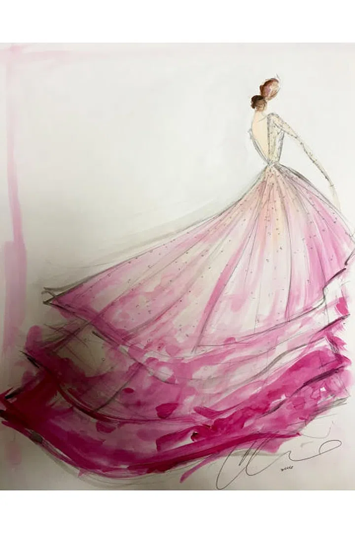 The bride turned to her friend, designer Christian Siriano for her custom, non-traditional wedding gown. Siriano also created looks for her mother and sister. The ombré tulle ballgown with a high-low hemline had a low back and an illusion sweetheart neckline, which along with the long sleeves was completely covered in delicate degradé beading that worked its way into the skirt. Photo: Lara Porzak