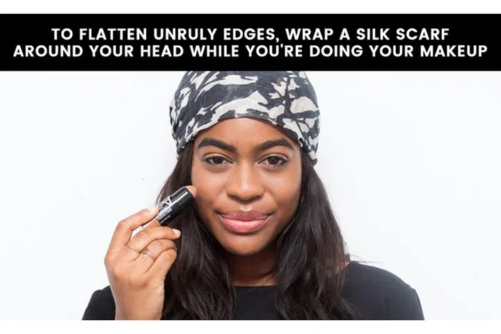 20. Use a silk scarf to blend your unruly leave out with the rest of your extensions. Since silk retains moisture (cotton absorbs it) and your head gives off heat, you'll want to wrap a silk scarf around your head, flattening your leave out as you secure it. That way, as you do your makeup, the heat from your head will be trapped under the silk and coax your hair to lay flat.