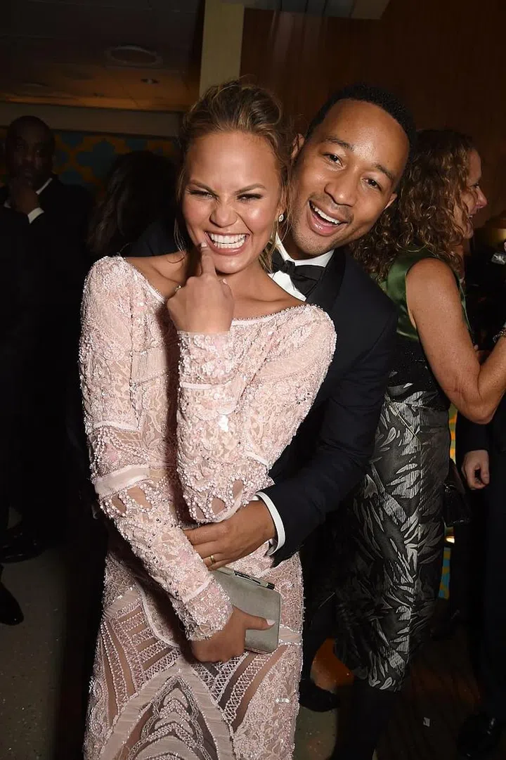 BEVERLY HILLS, CA - JANUARY 11:  Model Chrissy Teigen (L) and recording artist John Legend attend HBO's Official Golden Globe Awards After Party at The Beverly Hilton Hotel on January 11, 2015 in Beverly Hills, California.  (Photo by Jeff Kravitz/FilmMagic)