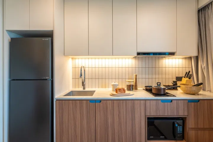furnished kitchen in weave suites serviced apartments in singapore