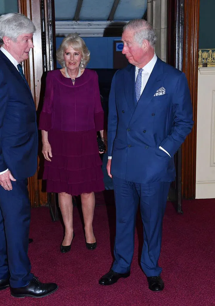 Charles and Camilla arrive.