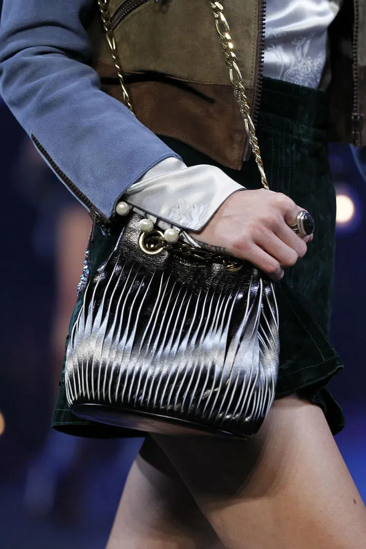 Seen at: New York Fashion Week//Why we love it: The sliced leather design hanging between a metallic chain handle gives this masterpiece a street punk edge that's both modern and cool. (Photo: Getty)