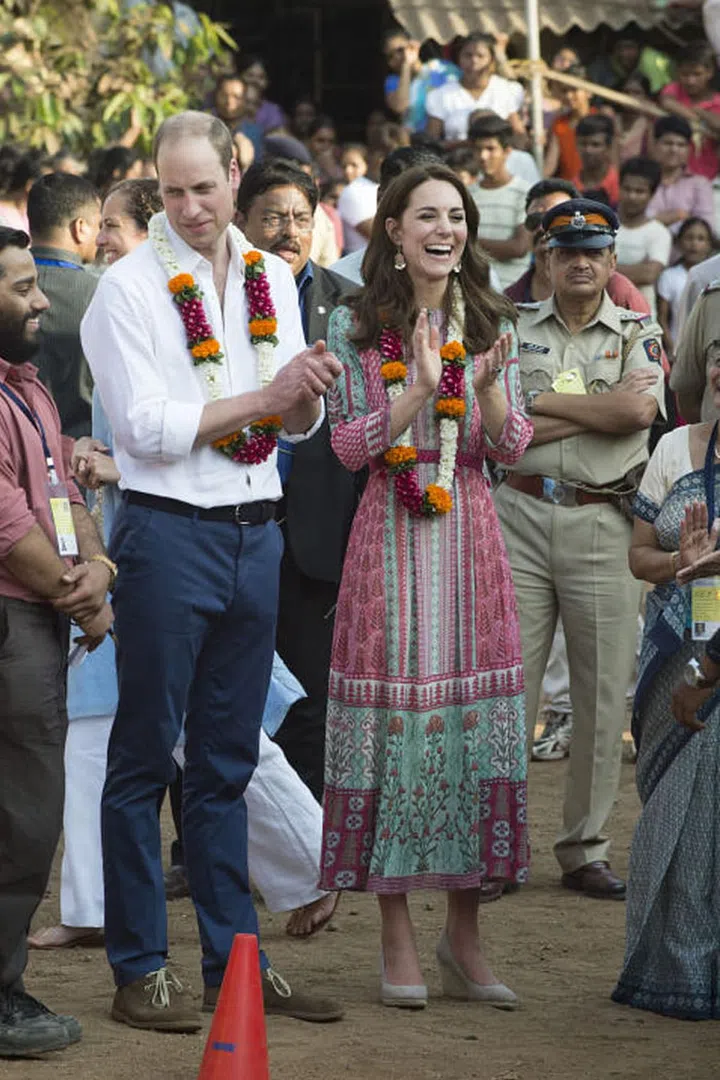 Kate and William attend a soccer game during a visit to the Banganga Water tank in Mumbai, where they met representatives of SMILE, an NGO helping provide education for underprivileged children. Photo: Getty
