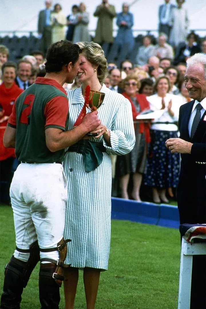 Sharing a moment at a charity polo match in Windsor. Photo: Getty 
