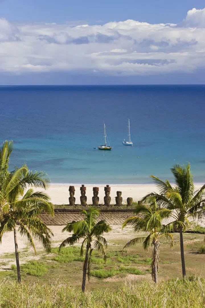 An unusual site on the otherwise rocky coast of Easter Island, the white sand beach at Anakena is also home to several Maoi statues carved by the Rapa Nui people.