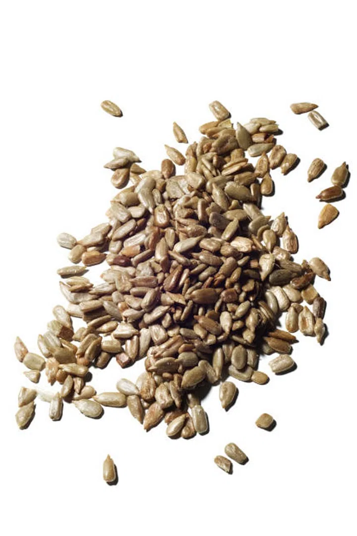 Nuts (almonds, walnuts, peanuts, etc.) contain moderate levels of tryptophan, and are a filling snack to eat if you wake up in the middle of the night starving. 