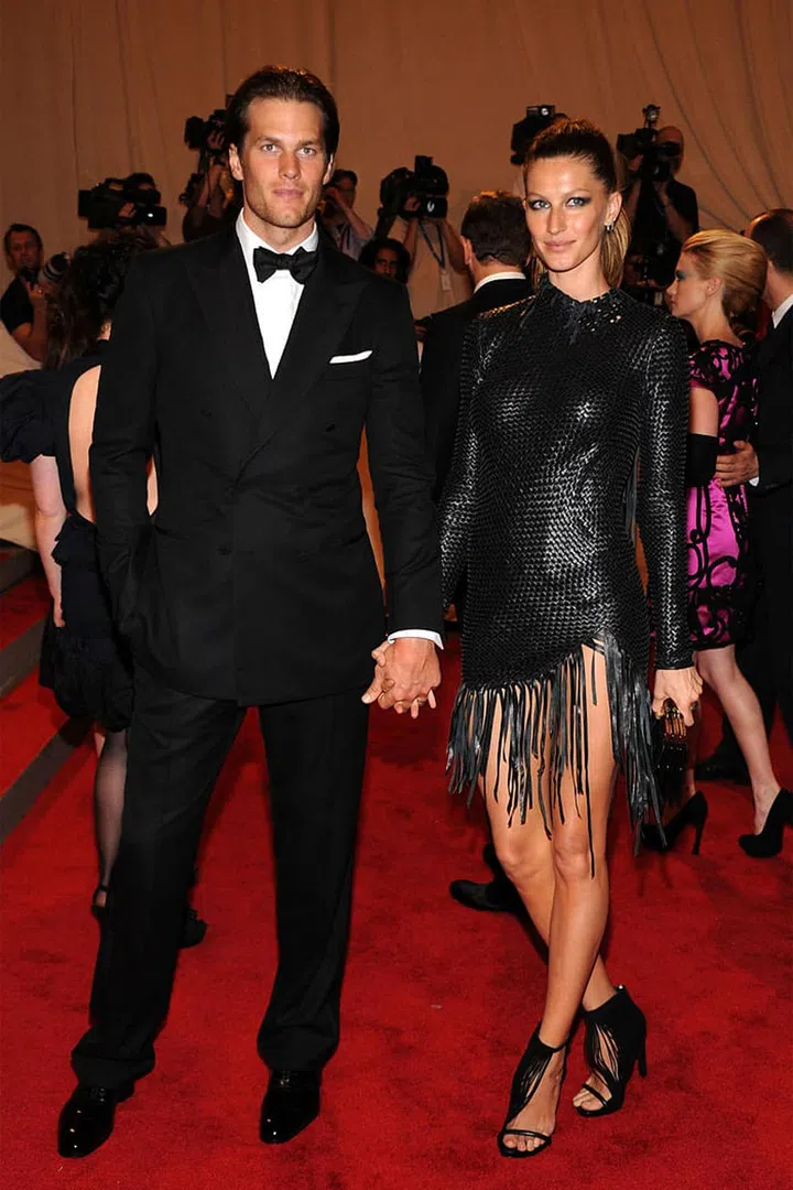 Supermodel Gisele Bundchen planned not one but two secret weddings back in 2009. The couple's first ceremony took place in Santa Monica at a small Catholic church, while the second was held at the couple's Costa Rican vacation home. Five years later we finally caught a glimpse of the dress (via Instagram) but the designer is still unknown.
