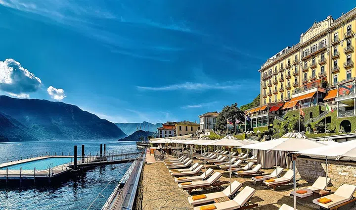 Greta Garbo referred to Grand Hotel Tremezzo as ‘that happy, sunny place’ back in 1932, and that glowing perception still resonates with well-heeled jetsetters, royalty, and celebrities today. James Bond even made an appearance when parts of Casino Royale were shot here for the 2006 remake. The Art Nouveau landmark occupies a prime position on Lake Como in Tremezzo, across from Bellagio and adjacent to the famed Villa Carlotta gardens, which holds jazz concerts during the summer. Natalie Portman, Gwen Stefani, Van Morrison and Edward Norton are just some of the notable guests that have checked in here over the years. George Clooney, who has a place nearby, is also known to frequent the hotel’s restaurants that boast menus created by iconic Italian chef, Gualtieri Marchesi.