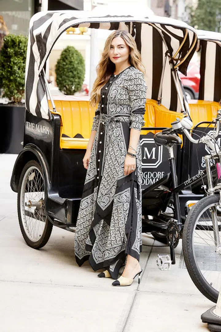 "I always pack a printed dress when I travel because it's an easy piece to dress up or down depending on whether I'm heading to a business meeting with Mira (Miroslava Duma, co-founder of The Tot) or a dinner out with friends." Describe your style in 3 words. Casual, Sophisticated, Fun
Tell us what The Tot is in one sentence… The Tot is a mommy/baby luxury lifestyle site that emphasizes healthy, safe and non-toxic products for women and children through a shop-able e-commerce platform and expert contributors who write about a variety of parenting topics. Pictured: Altuzarra dress, Chanel shoes. Photo: Chris Clinton
