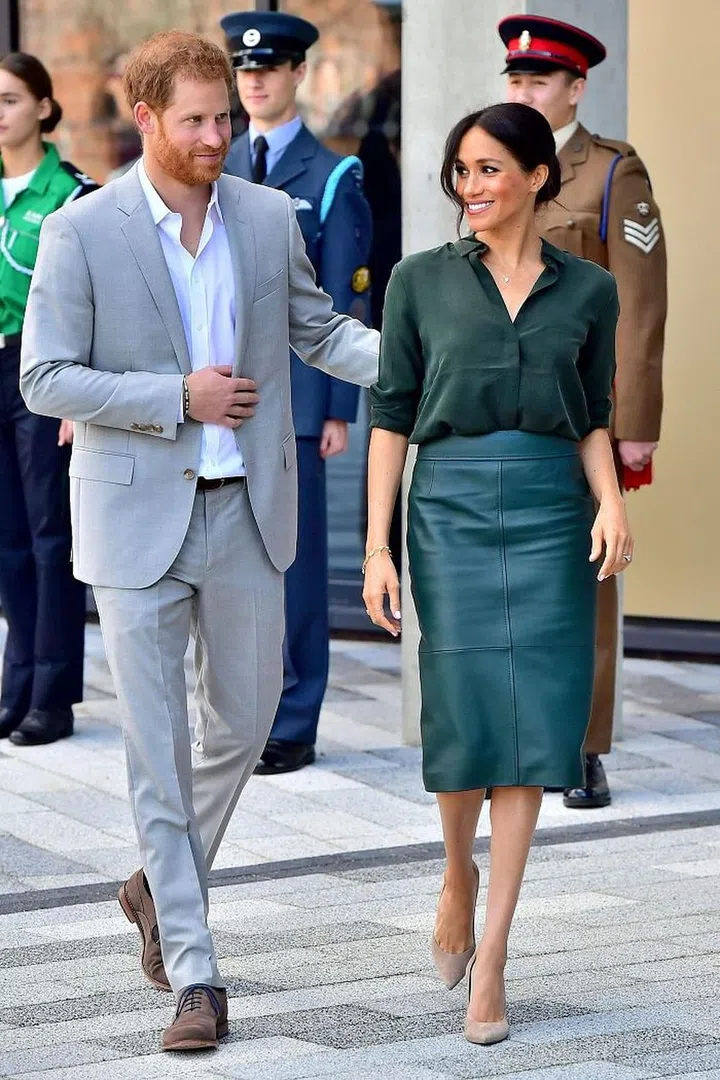 The duchess later took off her coat to give us a better look at her bottle green & Other Stories shirt.