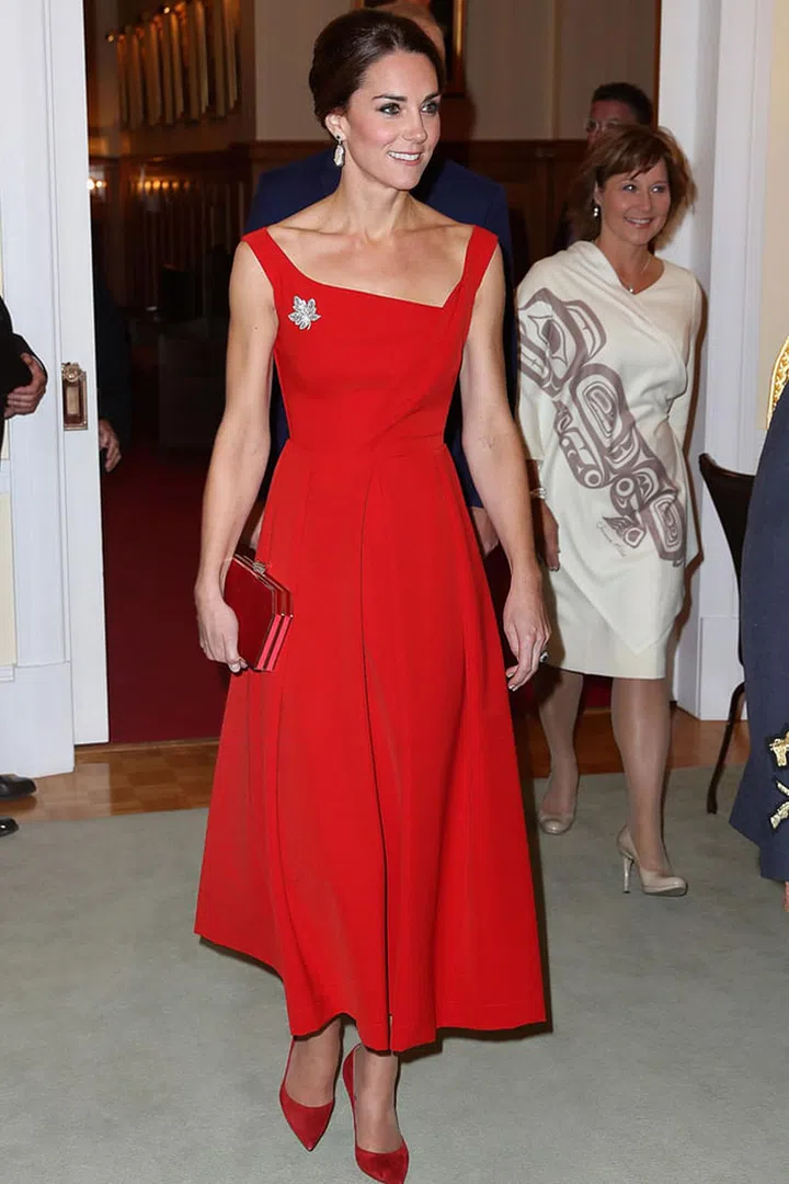 As proven when she bought this beautiful Preen dress in both red and black, the Duchess knows what suits her and isn't afraid to wear the same thing more than once.