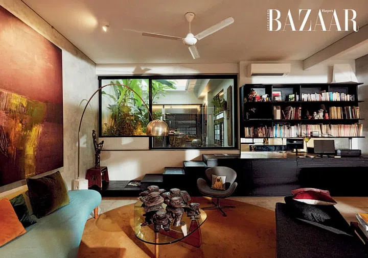 The renovated space has an unobstructed view from the bedroom to the front door, adding a sense of depth and openness to the entire home. 