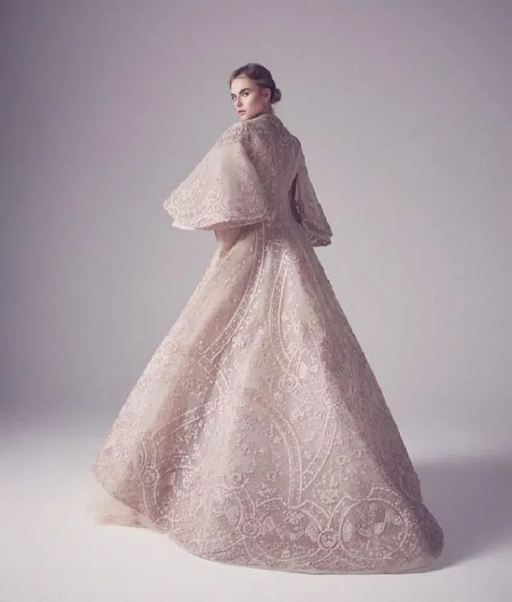The Middle East has long been known as an epicenter of glamour, and Beirut based Ashi Studio caters to the area's most opulent–with a keen eye for innovative, architectural silhouettes and intricate embroideries. The designer has been praised for his Couture bridal for seasons but in our opinion, his work hasn't yet received the love it should stateside. With a rise in the brand's celebrity fanbase–SJP has worn the label, Zendaya has shown them love on the red carpet, Lady Gaga donned a custom gown for the promo of her debut on American Horror Story and Whitney Port wore the brand down the aisle–and a capsule of Couture bridal available out of their Lebanon-based studio, we're hoping more and more American brides with a flair for the dramatic take notice.
