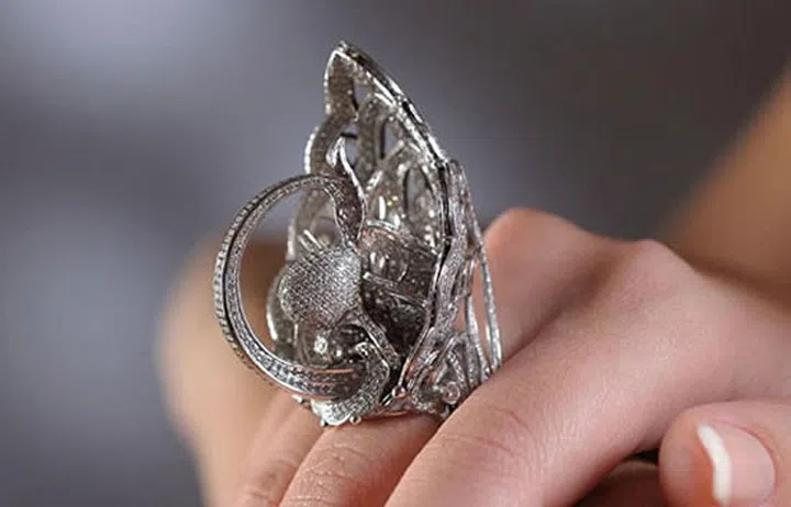 With 2,525 diamonds coming in at a total of 10.48 carats, the Tsarevna Swan Ring holds the Guinness World Record for the most diamonds ever used in a wearable ring. The stunning piece of jewelry is valued at $1.3 million, according to Business Insider.