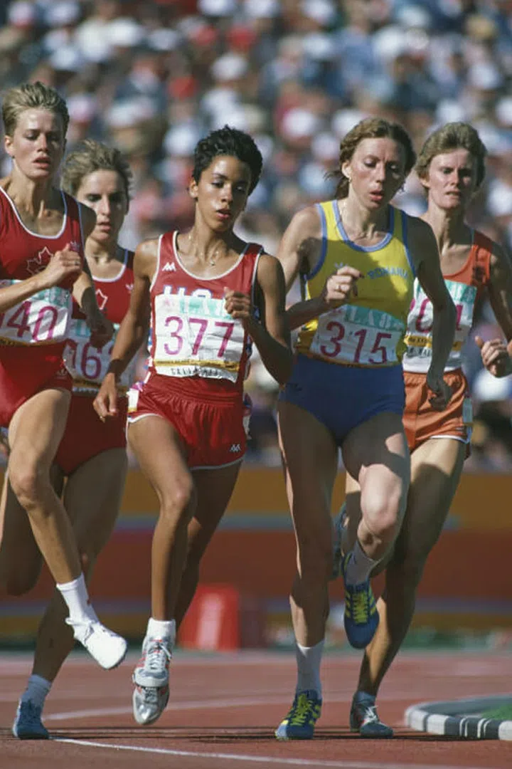 The women's 800-meter race at the Los Angeles Memorial Coliseum. The '84 Olympics are the first to be entirely funded through private sponsorship, ushering in an age of athletic sponsorships with big sports companies such as Nike, Puma, Adidas, etc. Photo: Getty
