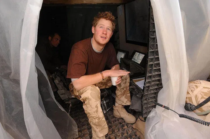 Prince Harry, 23, photographed in Afghanistan while serving in the British military.