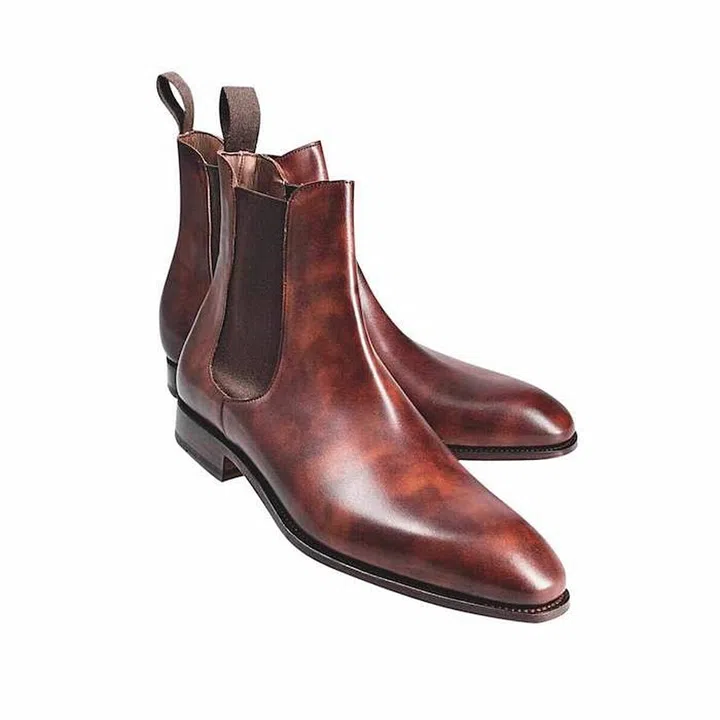 Boots, about $558, Carmina